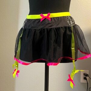 Cacique. Sheer Black with neon pink/green skirt with garter straps. 18/20